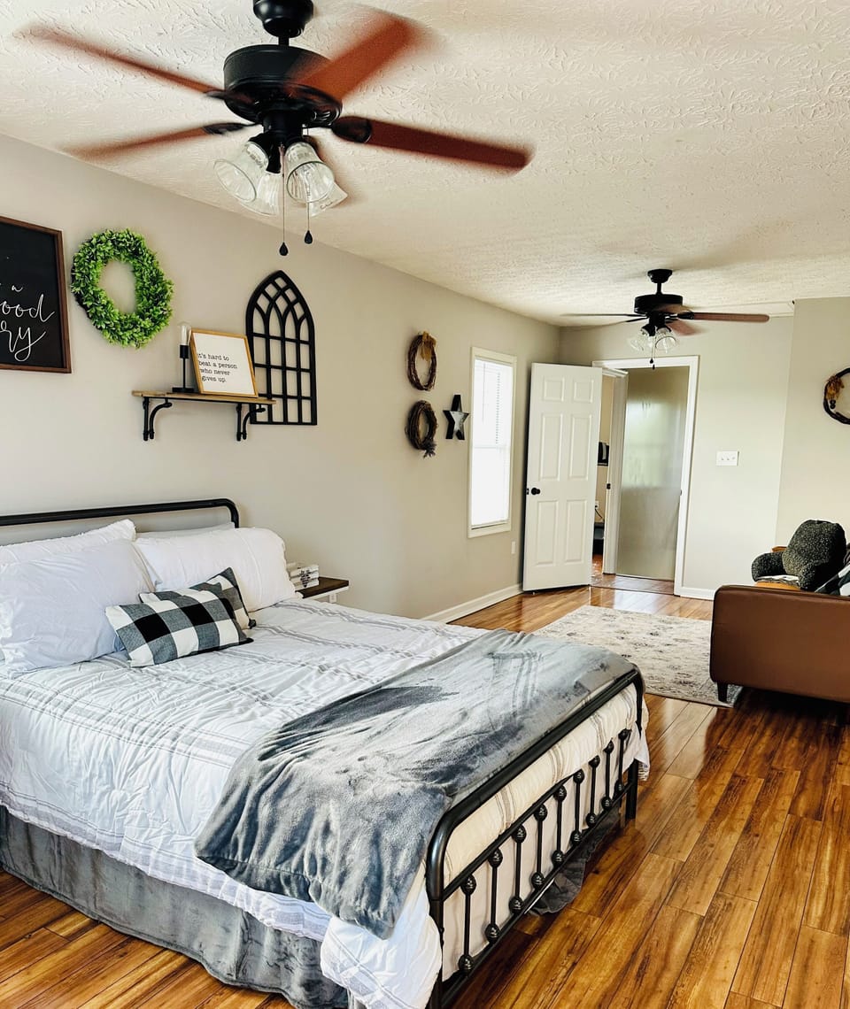 Bedroom 2 with queen bed and futon