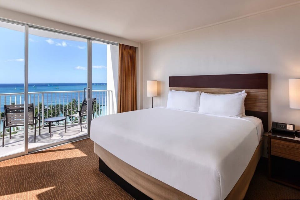 Stretch out in a king bed with sparkling ocean views.