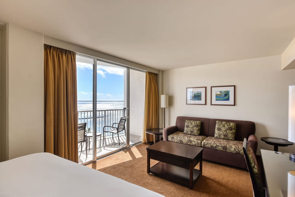 Lounge comfortably after the beach, steps from the balcony.