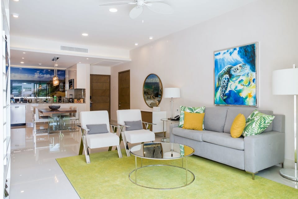 Full kitchen with appliances, dining area.