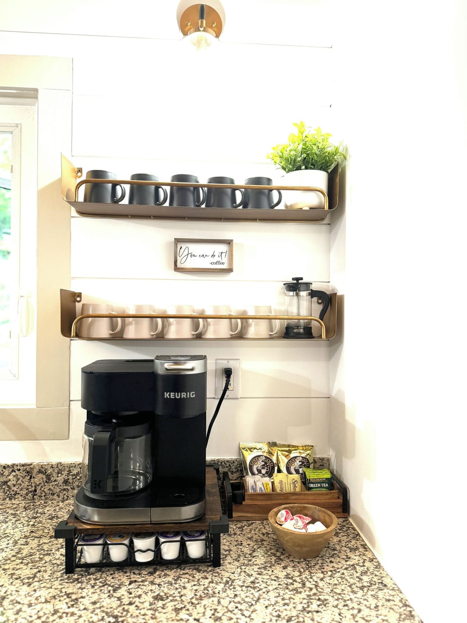 Coffee station stocked with K-cups, creamer, coffee packs, sugar and more!