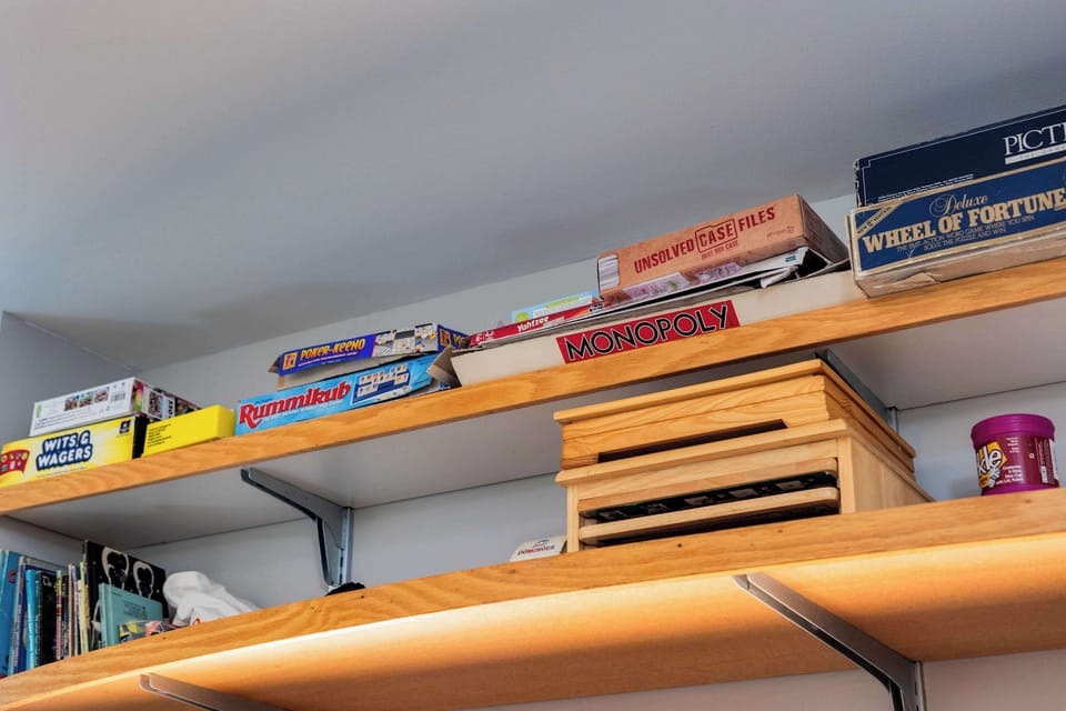 Pick your favorite board game off the shelf, Monopoly, Rummikub, or Wheel of Fortune are all ready to go.
