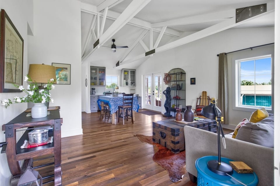 Open floor plan with soaring ceilings