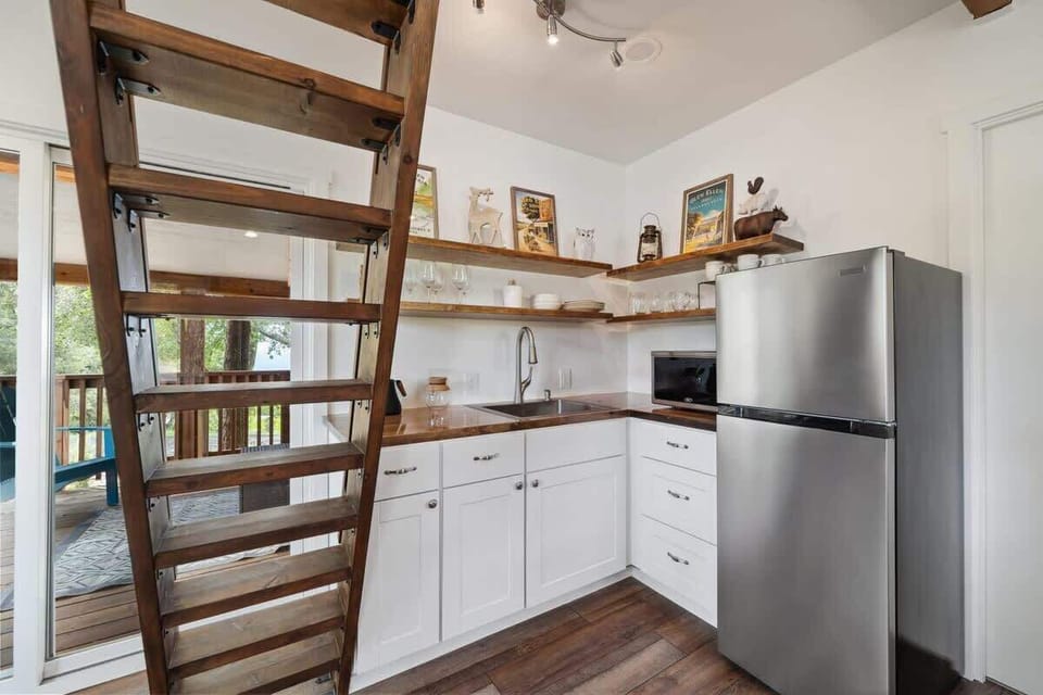 Whip up breakfast or brew a fresh cup in this bright, stylish little kitchen.