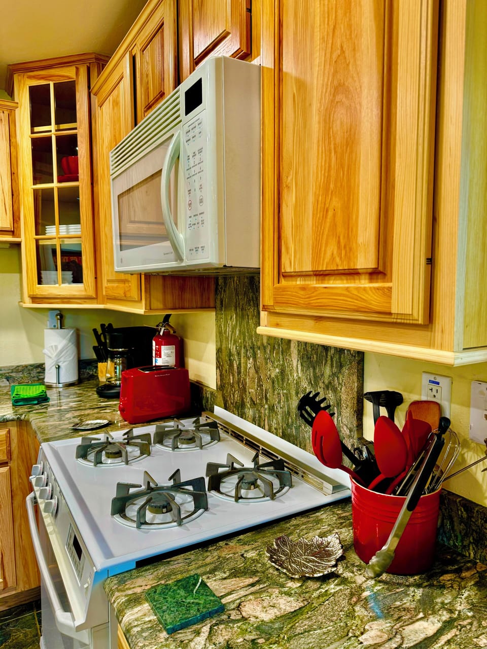 The kitchen has everything a cook needs with all appliances & cookware, etc.