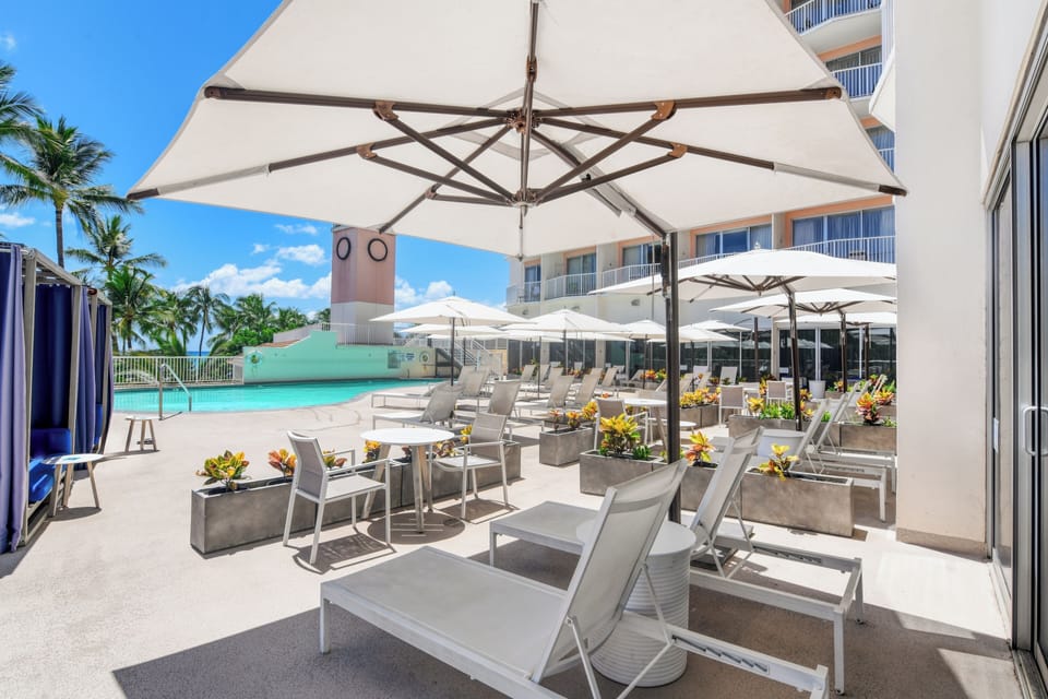 Stretch out on sun loungers steps from the sparkling pool.