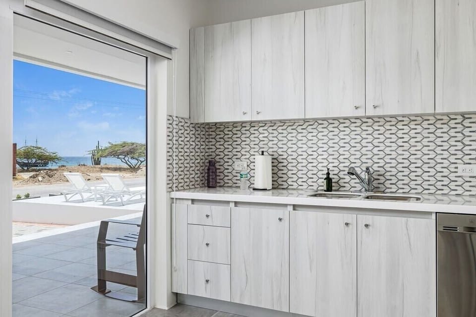 Kitchen
Fuel your stay with warmth and flavor in our welcoming kitchen. It's more than just a room; it's the heart of our home.