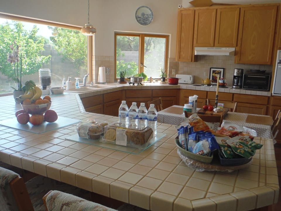 Walking up to the kitchen after coming home.  On the left is the refrigerator.