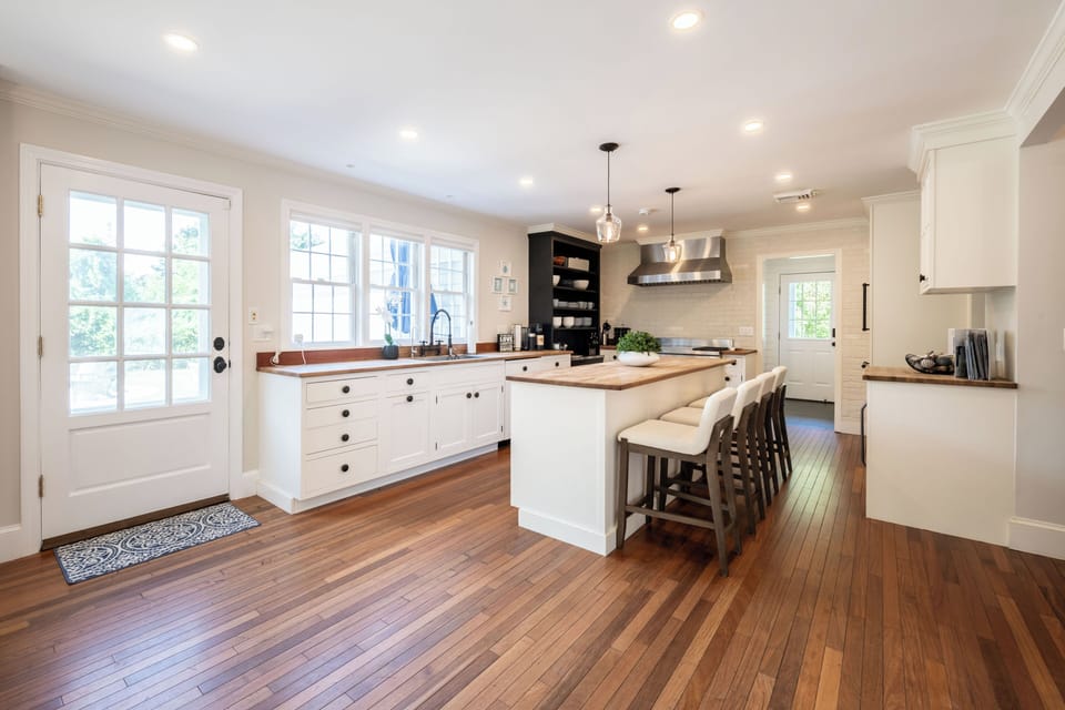 Chef's kitchen w/ bar seating , Bosch appliances & Wolf Double Oven