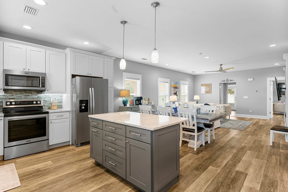 The kitchen opens up to the rest of the living space so no one misses anything