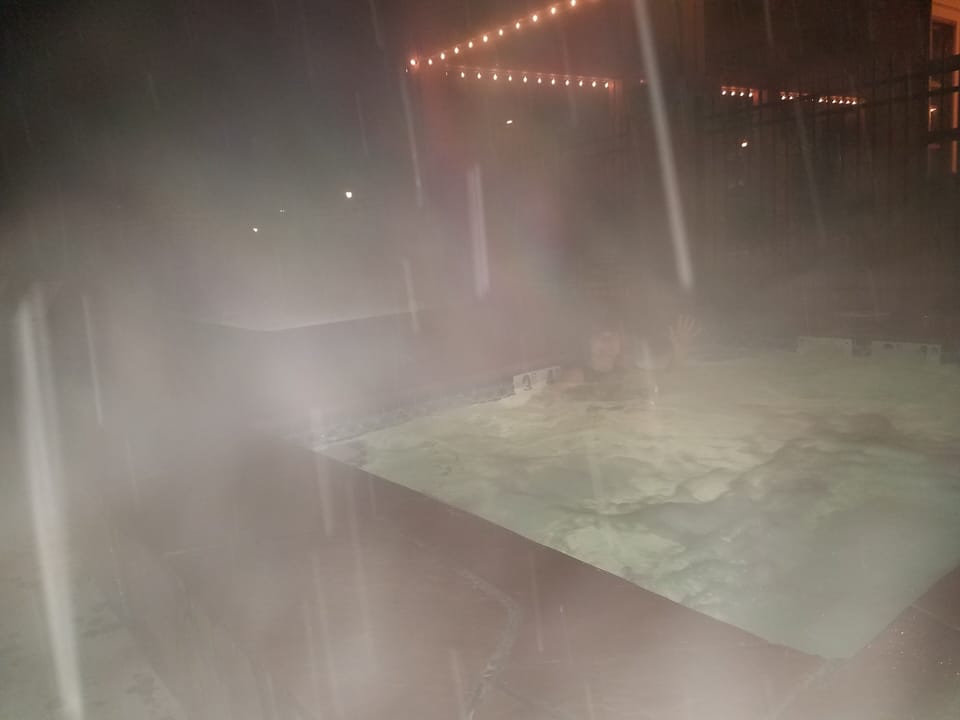 tubbing in the snowstorm, mountain-fresh