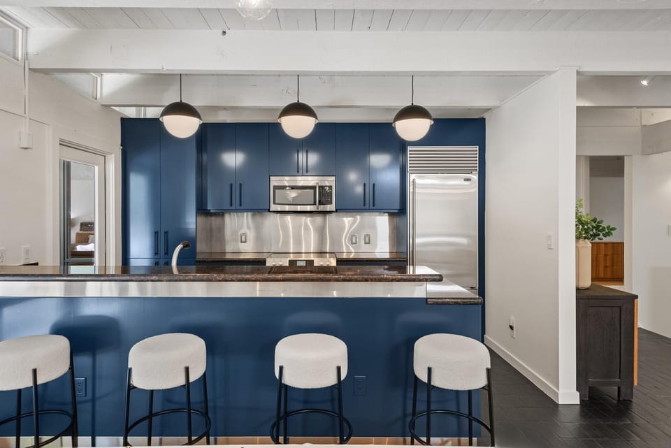 Blue cabinets to match the vibe. 
