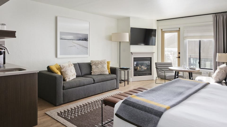 Gather fireside, then drift to sleep in cozy comfort.