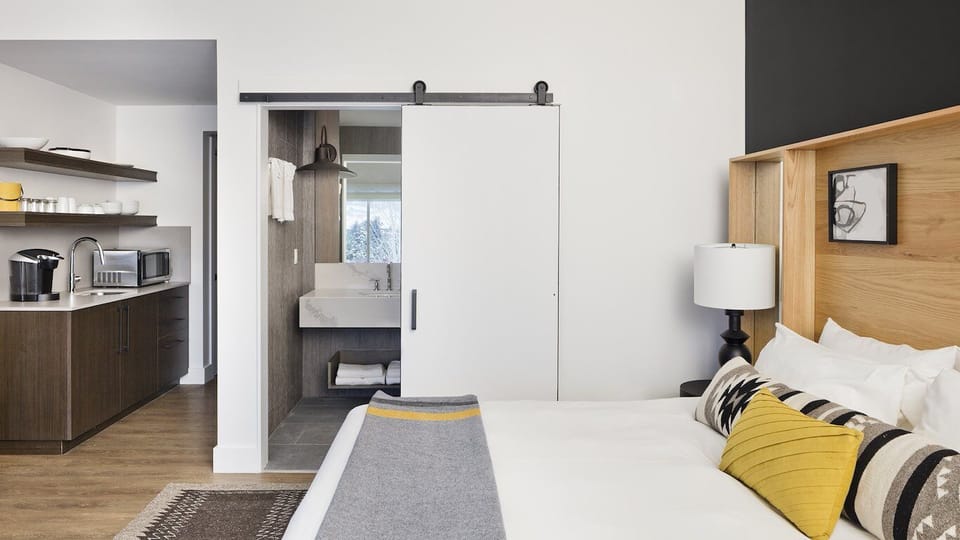 Settle in with handy kitchenette comforts right beside the bed.