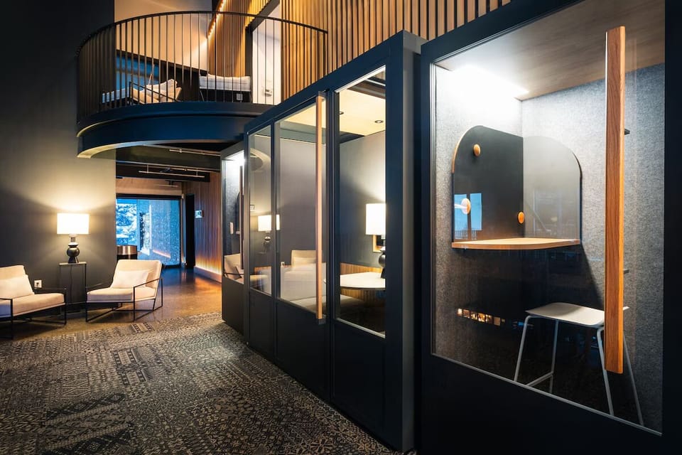 Settle into cozy lounge seating with warm, designer lighting.