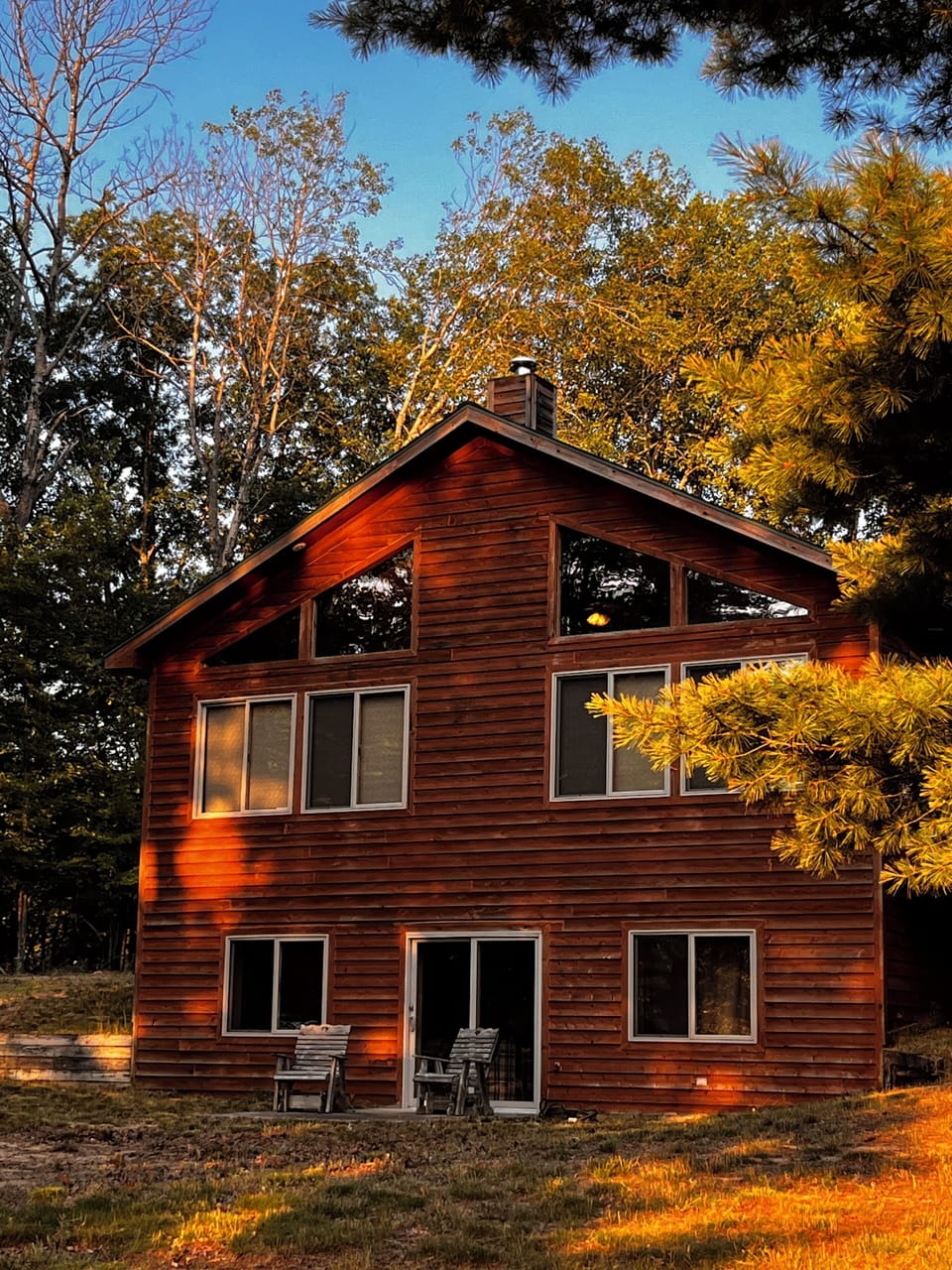 View from Pond looking at walk out basement side of the cabin.