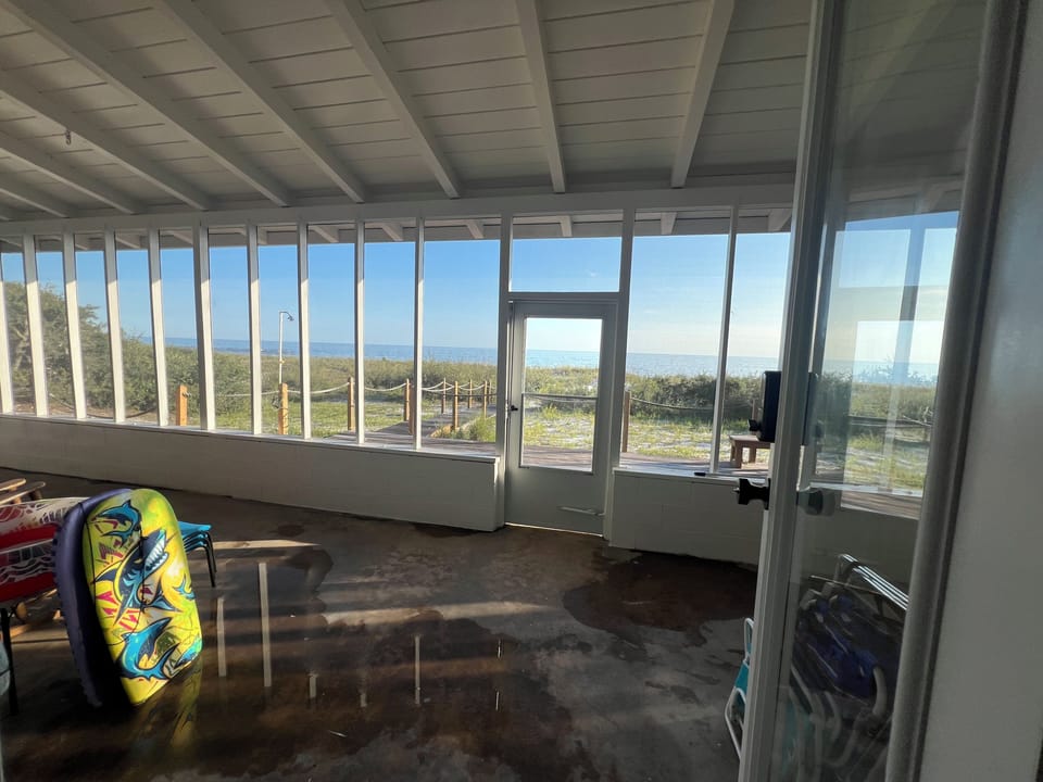 Walk right onto the beach from your back door. Screened porch with rockers 