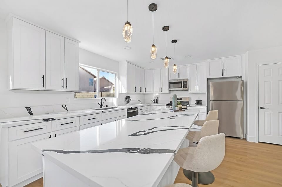 Modular Kitchen with island top and essential appliances 