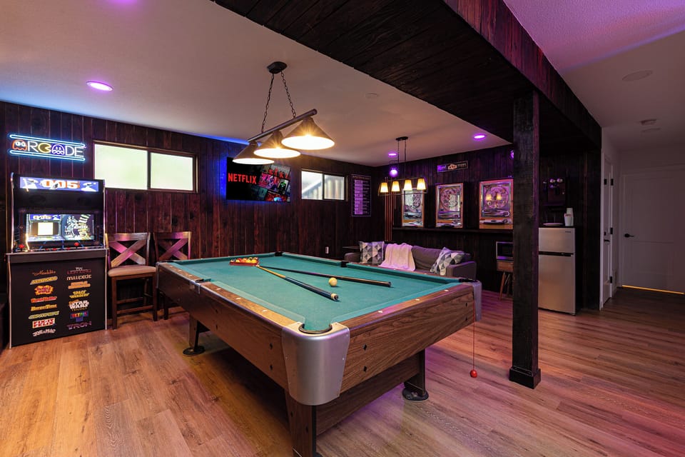Enjoy a round of pool and try to beat your high score on fave arcade games.