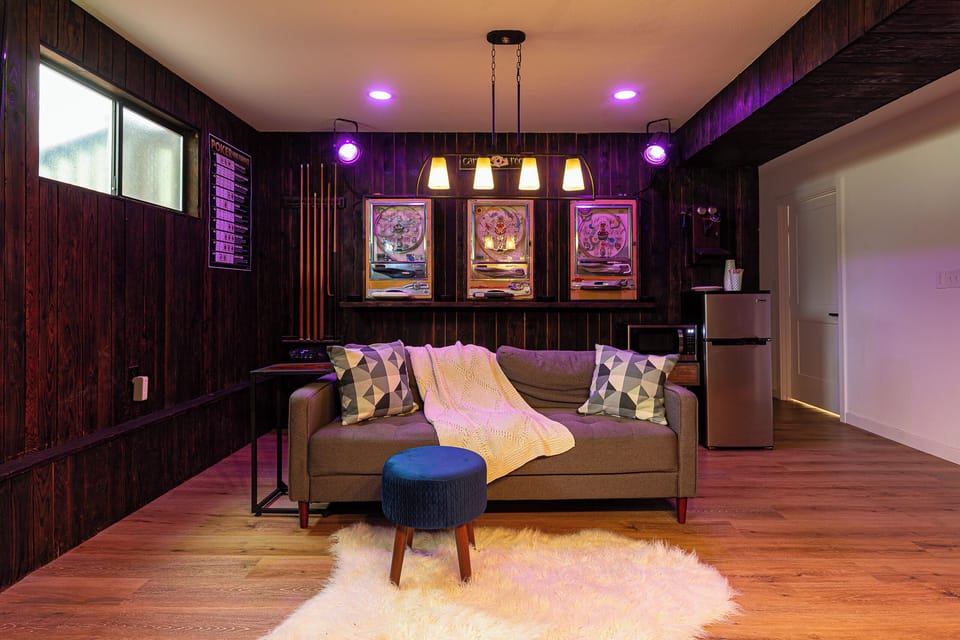 Make your stay comfy with couch, pillows, blankets, and a table for snacks.