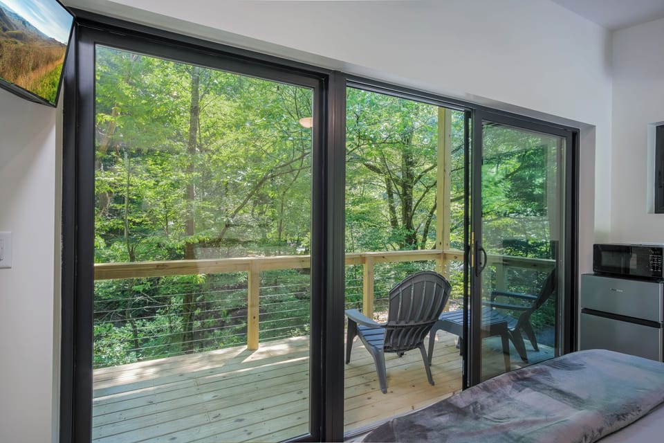 Overlooking the French Broad River (photo taken before hot tub was installed on porch)