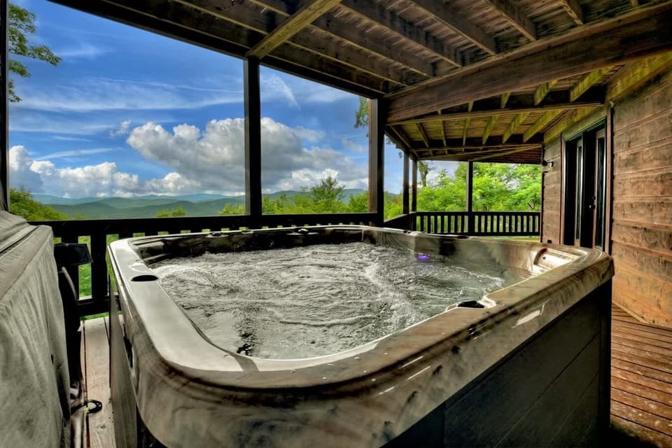 Bubbling hot tub on lower covered deck