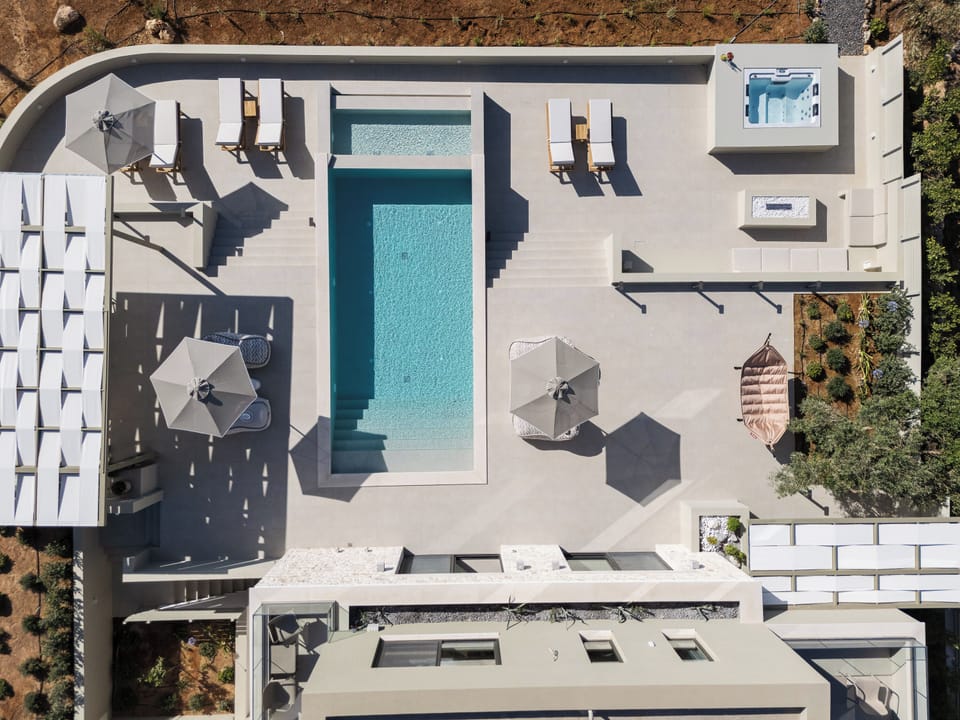 The pool terrace is equipped with high quality sun beds, umbrellas & a hammock. 