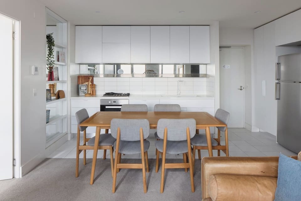 Pick up some fresh produce at Queen Victoria Market to cook up in the compact kitchen, which has all you need to prepare meals plus a dishwasher for easy clean-up. 
