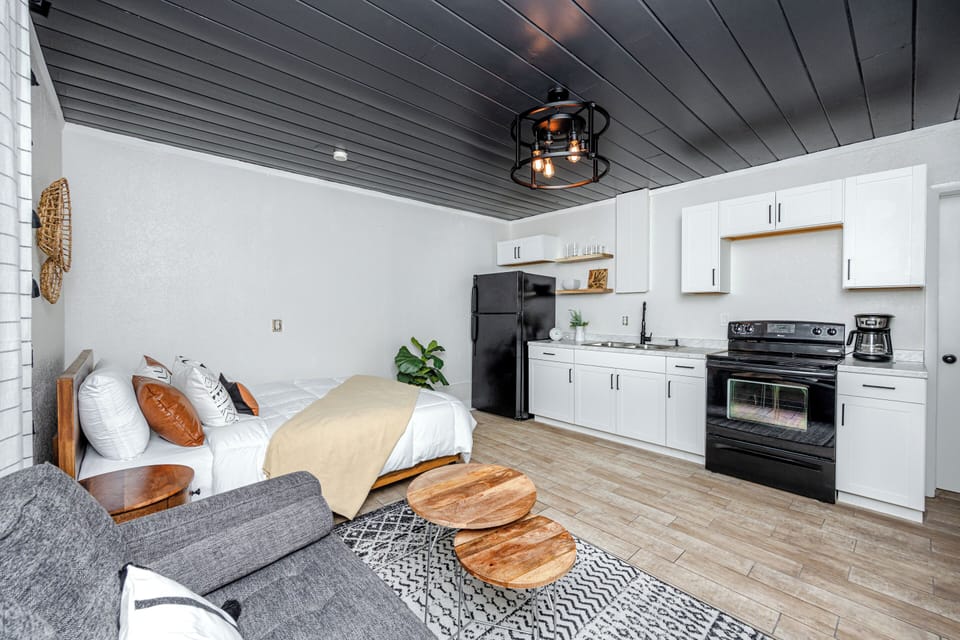 Cozy studio with modern kitchen and open living space.