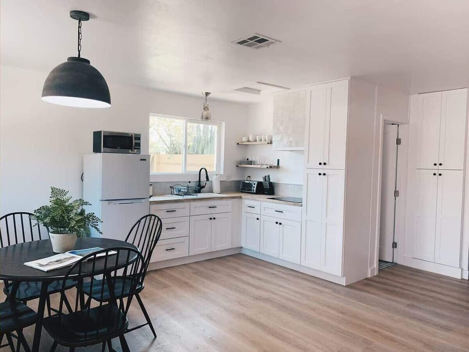 Prepare delicious meals in your fully equipped kitchen, designed for your culinary convenience.