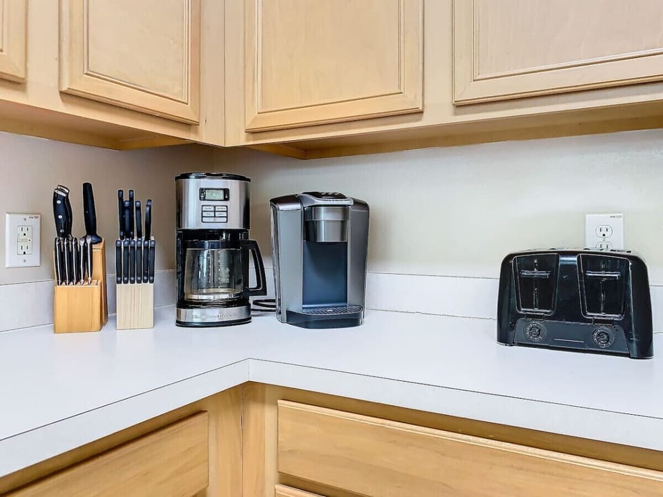 Modern, fully stocked kitchen with all the essentials for cooking and dining.