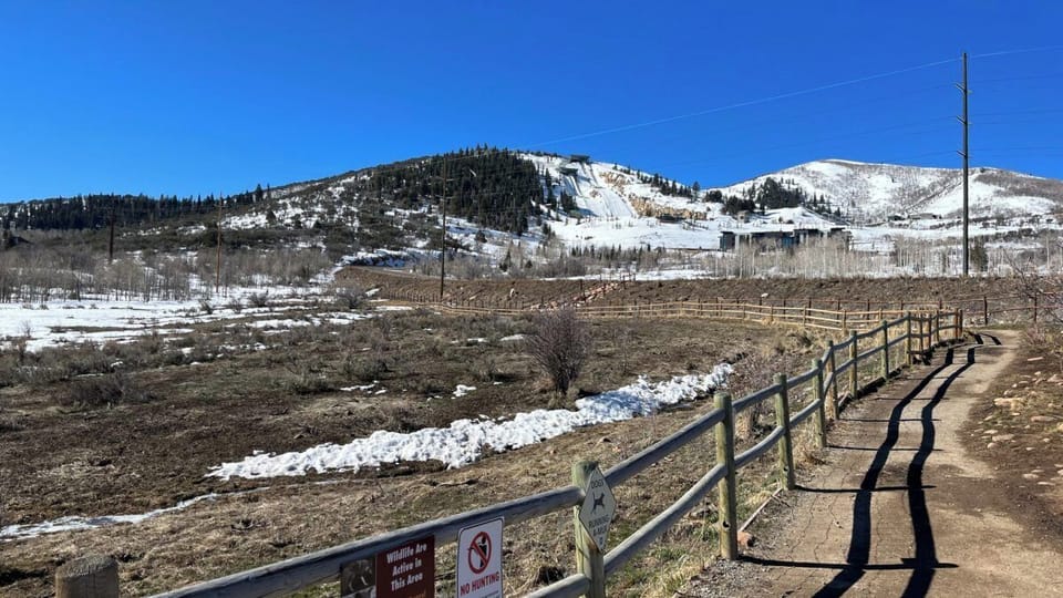 Wander crisp mountain paths with open skies and vistas.