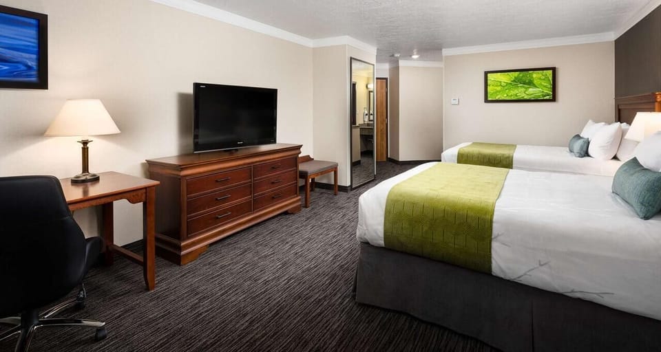 Stretch out in a spacious room with TV and seating area.