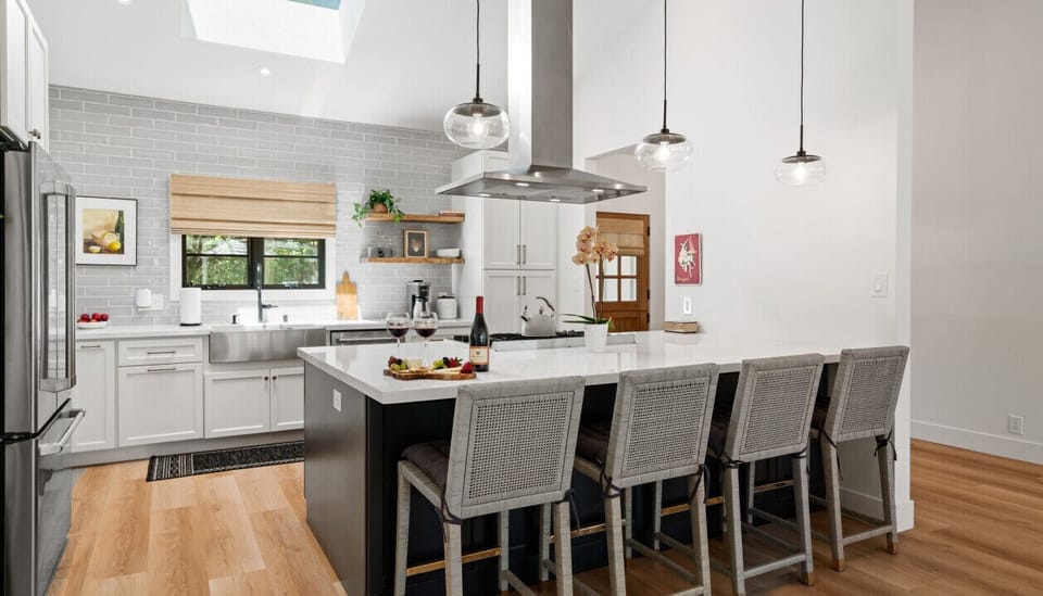 Belly up to the kitchen bar with your favorite meal and local drinks!