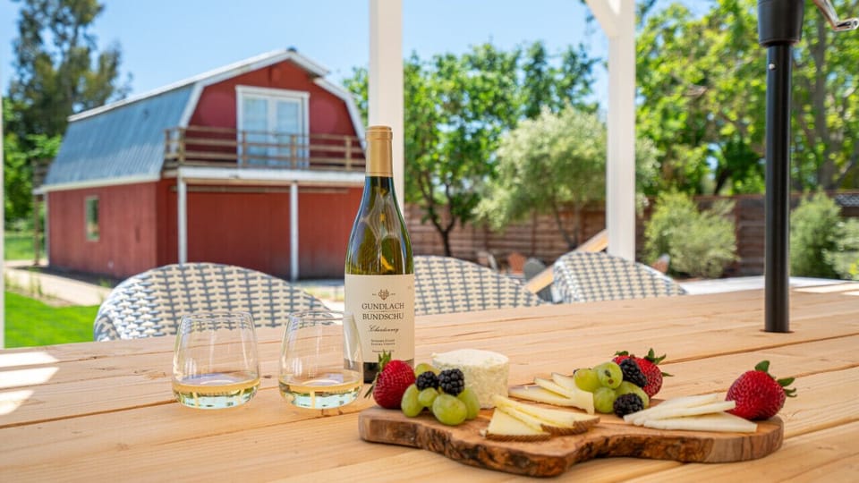Enjoy a glass of Sonoma Chardonnay on the outdoor dining table.