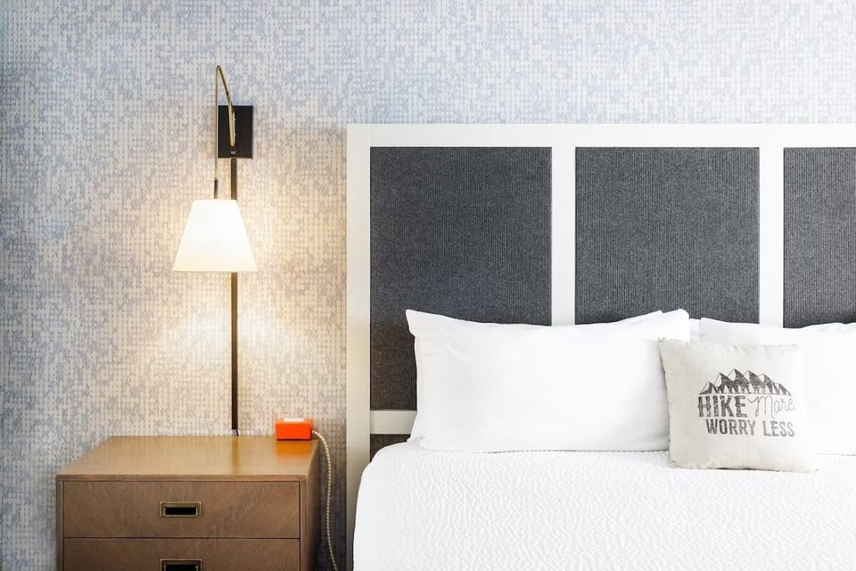 Enjoy cozy bedside glow for late-night reading and recharge.
