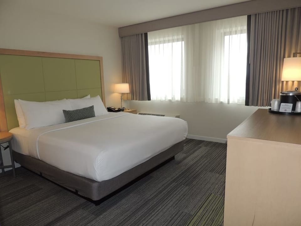 Unwind in a bright, spacious room with crisp linens.