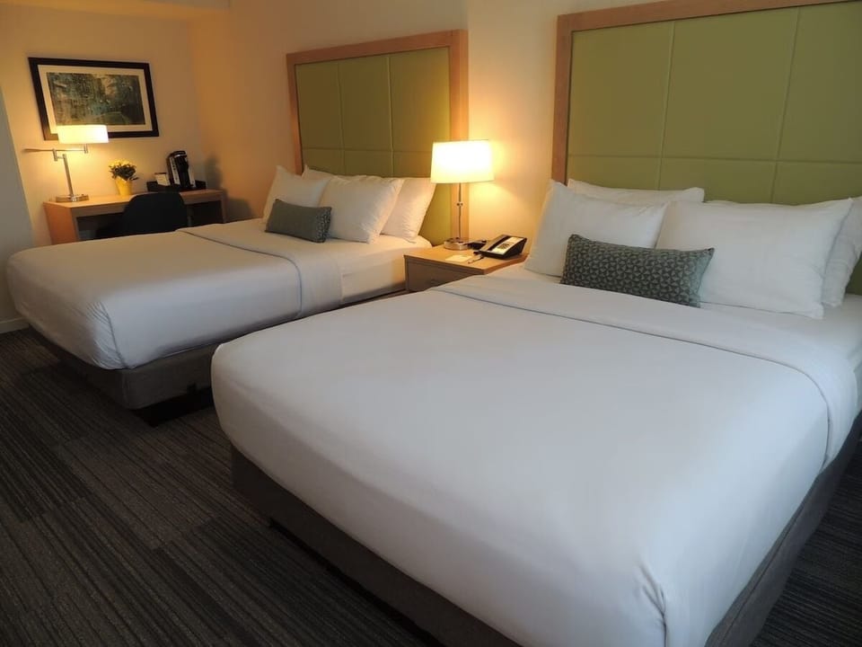 Settle in comfortably with two beds and soft ambient lighting.