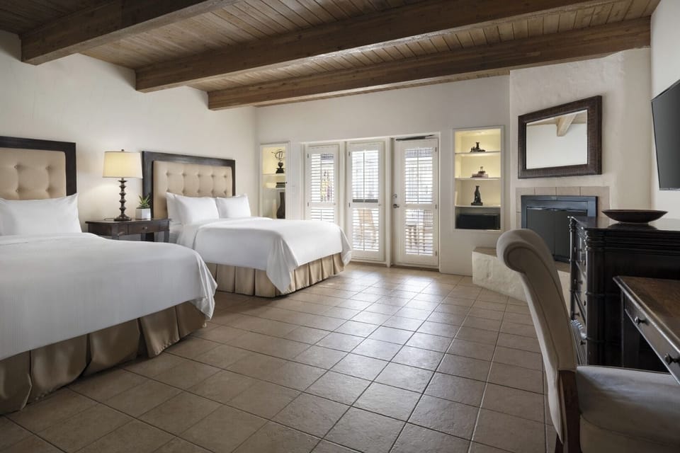 Settle in comfortably with two plush beds and vaulted ceilings.