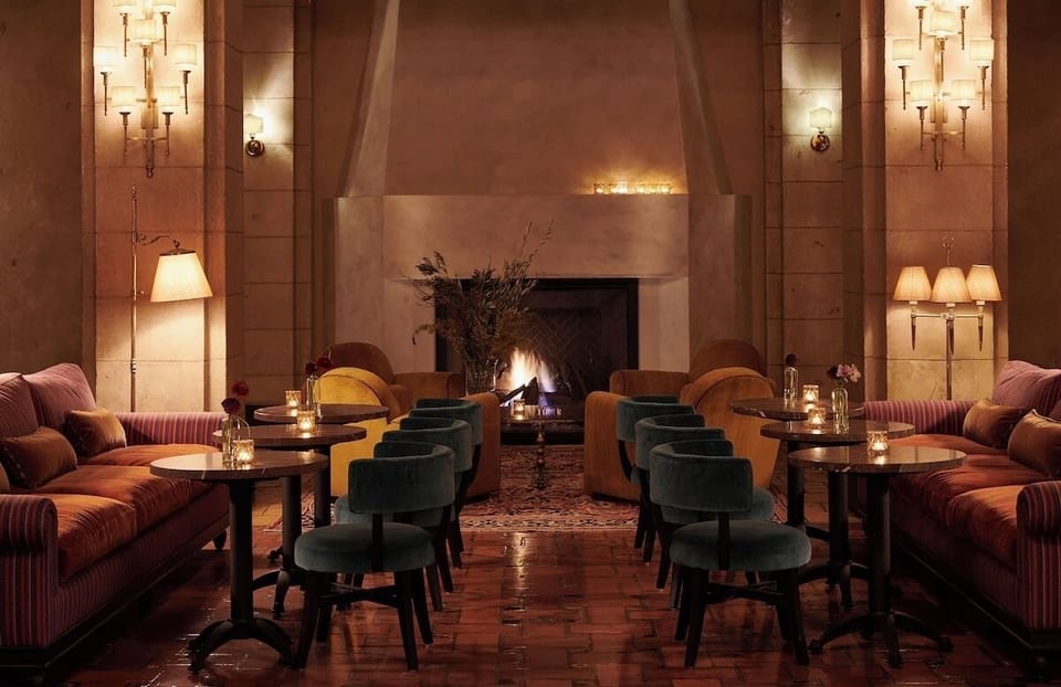 Settle in by the glowing fireplace for intimate evening cocktails.