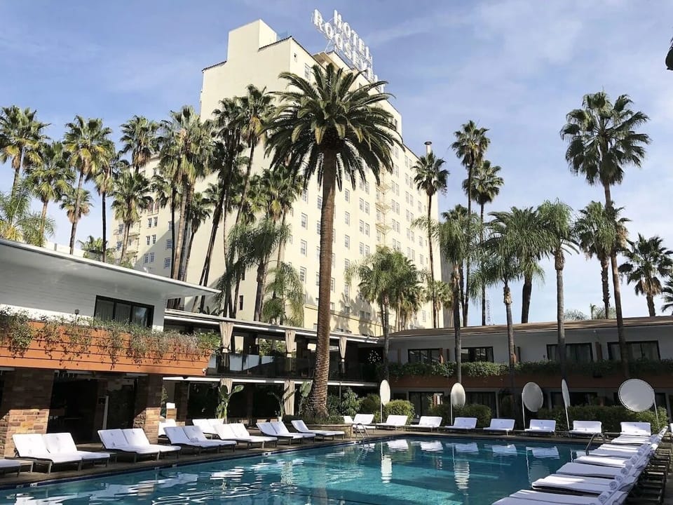 Soak up the classic palm-lined pool views all afternoon long.