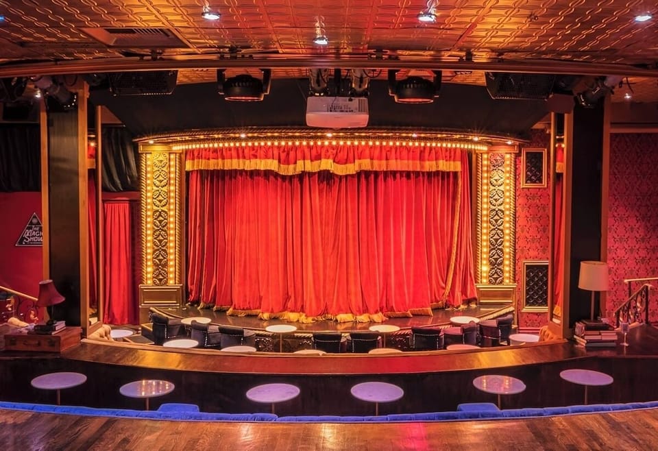 Catch a live-style show feel under rich velvet curtains.