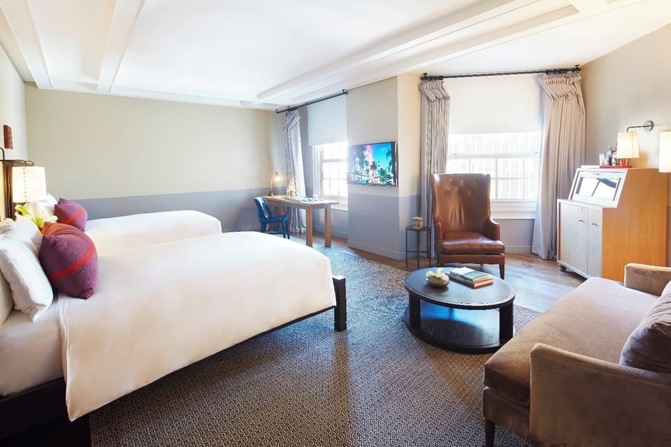 Relax together in an airy suite with lounge seating