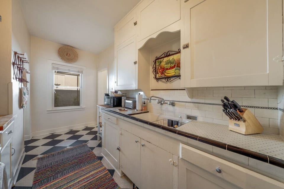 Quaint, well-appointed kitchen, stocked and ready for your stay (no dishwasher)