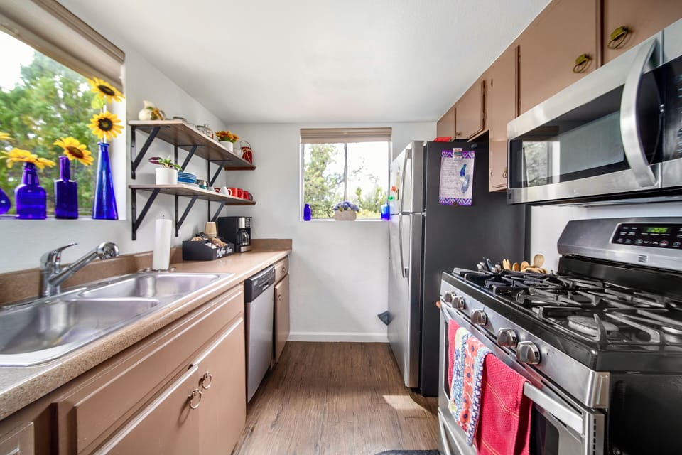 Our full kitchen includes dishwasher, fridge/ freezer, stove, oven, microwave.