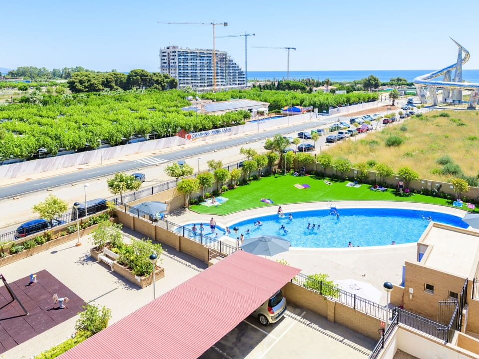 Plant, Building, Property, Sky, Water, Infrastructure, Swimming Pool, Architecture, Tree, Urban Design