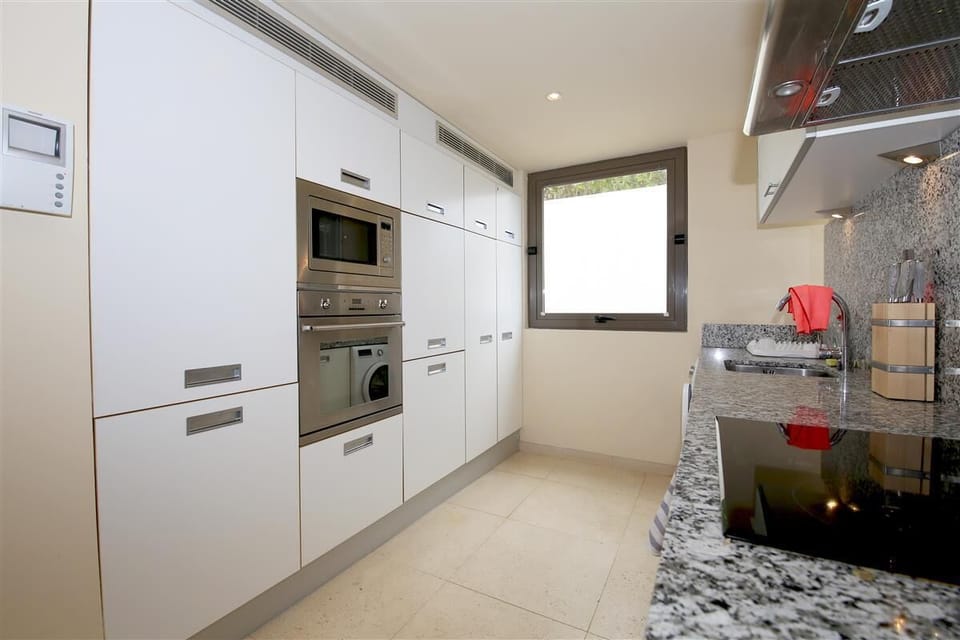 View of the fully fitted kitchen from a different angle