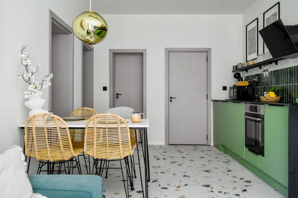 Elegant Dining: Savor meals at the stylish dining table, perfect for intimate dinners or family gatherings.