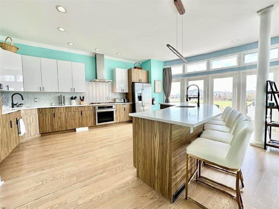 A few steps up from 1st floor is beautiful kitchen with amazing views