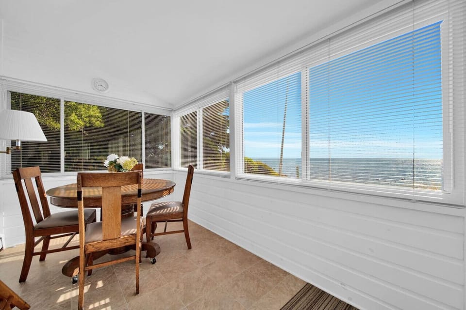 Three seasons porch with a game table with a view!